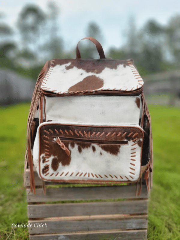 Brown And White Cowhide Backpack With Leather Fringe