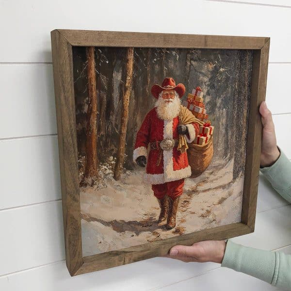 Santa Cowboy Bag of Toys - Christmas Wall Art - Wood Framed: 15x15" Medium Canvas Art with Thick Wood Frame
